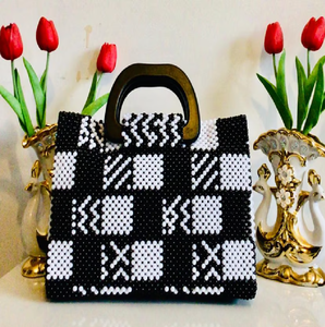 Stylish <b>black</b> and white checkerboard pattern beaded handbag, unique dark wooden <b>top</b> <b>handle</b>, available at wholesale prices. . - Product Image 1