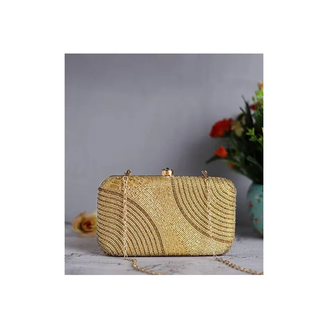 Buy Best Quality Golden Hard Case Clutch, golden bling purse with Designer Pattern