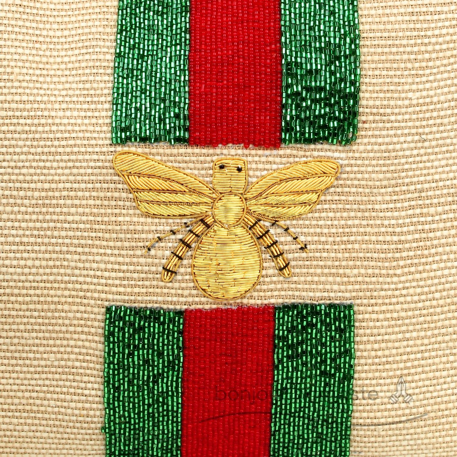 Beige with red, green and gold motifs