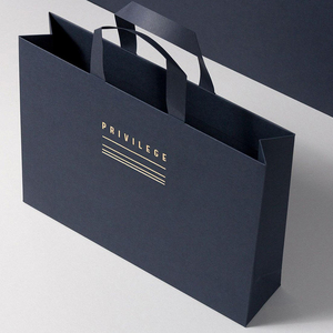 Bolsas de papel Kraft reciclables ecológicas personalizadas de gran venta fabricadas en China con su propio logotipo y cinta - Product Image 3