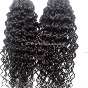 Extensions de trame bouclées pour cheveux indiens vierges Remy - Product Image 1