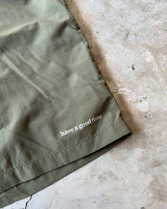 Vente en gros de shorts d'été décontractés pour hommes avec logo personnalisé style High Street pantalon à taille élastique en nylon utilitaire maille cargo taille moyenne solide - Product Image 4