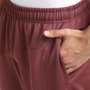 กางเกงจ็อกเกอร์ลำลองผู้ชายขายส่งขายดี ผ้าฝ้าย ระบายอากาศได้ดี รับผลิตตามแบบ OEM คุณภาพสูง สีพื้น - Product Image 5