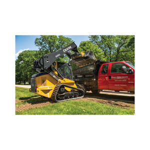 Chargeuse compacte haute performance avec ports hydrauliques auxiliaires et pneus industriels larges - Product Image 4