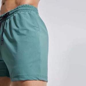 Pantalones cortos de entrenamiento de algodón 100% para hombre, pantalones deportivos de patrón sólido para gimnasio, pantalones deportivos con bolsillos en la cintura con cordón, pantalones cortos para correr al por mayor - Product Image 5