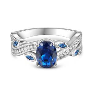 Bague de fiançailles Jeulia en saphir bleu taille ovale en argent sterling avec motif feuilles torsadées - Product Image 1