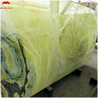 Dalles de marbre naturel onyx vert transparent Brothers Stone Dreaming Paradise pour murs et comptoirs
