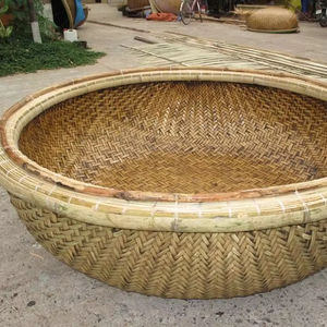 Barco de bambú vietnamita tradicional con diseño circular para pesca y viajes fabricado por VIET FARGIMEX - Product Image 1