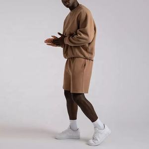 Ensemble de vêtements unisexe sweat-shirt à col ras du cou avec logo personnalisé pantalon de jogging vente en gros 100% coton polaire imprimé strass coupe-vent - Product Image 3