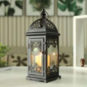 Exquisite <b>black</b> iron <b>lantern</b> with beautifully detailed craftsmanship and traditional European-inspired artistry - Product Image 1