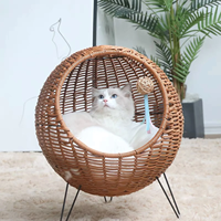 Lit pour animaux de compagnie en rotin surélevé chat chien maison ronde accessoires pour animaux de compagnie fabriqués à partir de matériaux naturels et décoration de la maison élégante, vente en gros.
