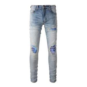 Jeans imprimés pour hommes en vente en gros Jeans style de rue empilés Slim Pantalon crayon Jeans décontractés pour hommes en denim - Product Image 1