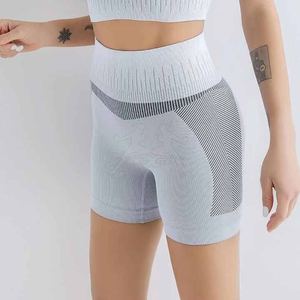 Shorts de sport et yoga pour femmes, couleur unie, matière douce et respirante, taille élastique, couleurs personnalisables, séchage rapide, OEM ODM, vêtements de sport confortables - Product Image 4