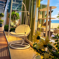 Fauteuil suspendu d'extérieur en aluminium résistant aux UV pour hôtel-resort, personnalisable OEM