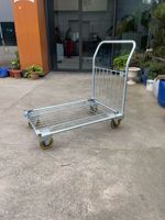 CargoMaster Pro Trolley Chariot d'entrepôt logistique de transport de marchandises industrielles à usage intensif avec cages en treillis métallique à quatre roues