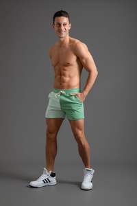 กางเกงขาสั้นซับเหงื่อสำหรับผู้ชายสีโทนสองสีกางเกงขาสั้นออกแบบโลโก้ของคุณเองได้ตามต้องการ - Product Image 3