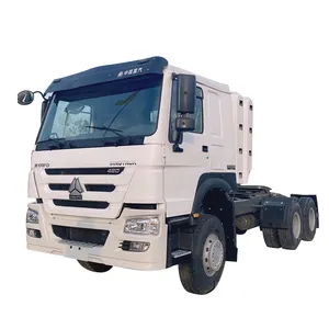 Venda quente de caminhões de trator de nariz longo Howo 6X4 reboque grande automático CNG usado