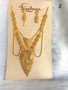 Hecho a medida en bonitos collares de latón de temática africana de diseño de chakra redondo con pendientes a juego para la reventa por diseñadores de joyas - Product Image 5