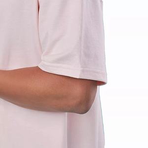 Camiseta holgada de color liso con opción de impresión de logotipo personalizado para uso casual, streetwear y promocional. - Product Image 5