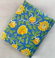 Tissu en coton artisanal imprimé à la main de Jaipur, motifs floraux botaniques, textile indien fait main pour la mode durable et les boutiques.