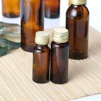 Botol Silinder Kaca Amber Tutup Sekrup Finishing Asam Terukir Logo Kustom Asal Shanghai-10ml/30ml/150ml/300ml Cairan Oral