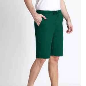 กางเกงขาสั้นลำลองผู้ชายเอวกลาง ผ้าฝ้ายฟลีซ 100% ระบายอากาศ แห้งเร็ว มีกระเป๋าข้าง เอวยางยืด ลายเรียบ - Product Image 5