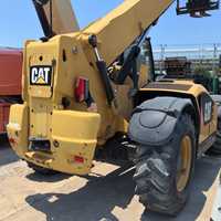 Chariot télescopique Caterpillar TH414 d'occasion, 2 tonnes, haute performance, diesel, tout-terrain, 4x4, avec mât à trois sections, hauteur de levage de 13,7 m