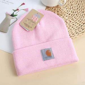 Écusson de broderie personnalisé avec logo pour l'hiver Bonnet en acrylique tricoté avec nœuds noirs unis 60 couleurs pour hommes femmes à revers en acrylique pour la plage - Product Image 5