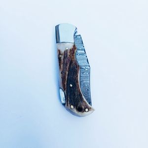 มีดพับแบบ Back Lock ทำจากเหล็กดามัสกัสสั่งทำพิเศษ พร้อมด้ามจับจากเขาสัตว์ ราคาสมเหตุสมผล เหมาะสำหรับกิจกรรมกลางแจ้ง - Product Image 5