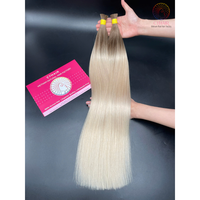 Vendeur en vrac de cheveux humains Style droit naturel couleur platine enracinée 100% cheveux crus vietnamiens non traités en vrac