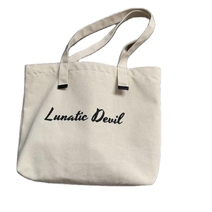 Vente en gros de sacs cabas en toile imprimés avec logo personnalisé sacs à provisions tendance en coton naturel avec motif de lettres - Product Image 1