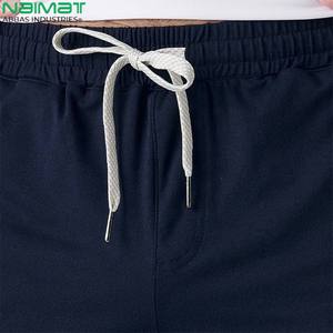 Pantalon de jogging uni doux et extensible pour hommes, décontracté, athlétique, coupe ajustée, taille élastique, poche à cordon, vente en gros de polyester et d'élasthanne - Product Image 3