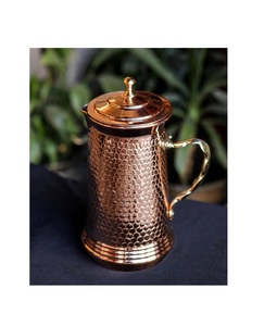 Handmade <b>copper</b> <b>jugs</b> for ayurvedic water storage promoting health and wellness with elegant hammered finish design - Product Image 5