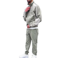 Survêtement décontracté d'hiver uni à capuche imprimé en nylon/coton léger, veste à cordon de serrage color block, fabricant de vêtements OEM