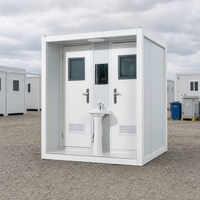 Cabine de toilettes portable à double poste avec lavabo central et portes en acier pour hébergement temporaire