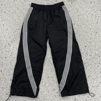 Nouveau style pantalon de survêtement en nylon pour homme, streetwear vintage d'hiver, coupe ample évasée, avec dentelle, perles et finition peinte imperméable