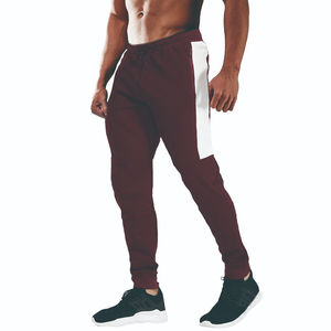 Vente en gros de vêtements pour hommes pantalons de survêtement empilés de haute qualité en éponge taille élastique sur le côté pantalon pour homme à rayures blanches - Product Image 1