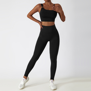 Conjunto de Yoga de alta calidad para mujer, mallas deportivas sin costuras con logotipo personalizado y sujetador, Top liso de compresión con patrón sólido - Product Image 3