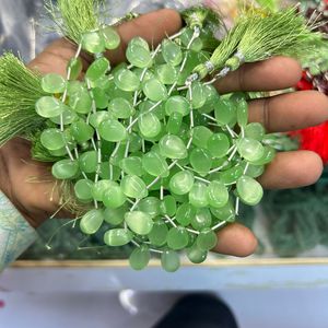 Monalisa พลอยหลวมรูปหยดน้ำตาลูกปัดในใยแก้วนำแสงสีเขียวพร้อมพลอยธรรมชาติทรงรีตัด - Product Image 1