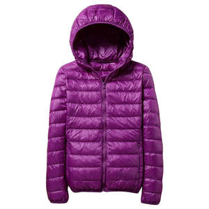 Chaqueta larga de plumón XL para mujer hecha a medida al por mayor con logotipo personalizado de tela transpirable Características del abrigo - Product Image 4