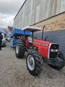 Used 2025 Massey Ferguson 385 4WD Wheel Tractor <b>Farm</b> Tractor With <b>Trailer</b> for Field Work - Product Image 1