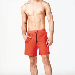 Pantalones cortos deportivos de secado rápido para hombre, cintura elástica, transpirables, pantalones cortos de entrenamiento para gimnasio, bolsillos, logotipo personalizado, joggers de cintura media tejidos sólidos - Product Image 5