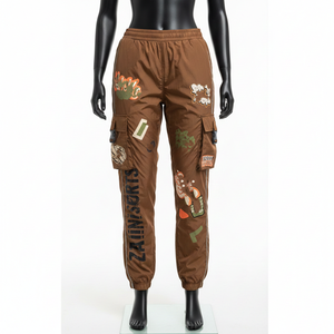 Pantalon coupe-vent pour femme, tissu en nylon léger de haute qualité 120 GSM, panneau utilitaire marron, logo thermocollé, pantalon coupe-vent - Product Image 1