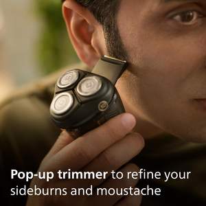 Afeitadora Eléctrica para Hombre con Tecnología de Triple Cuchilla, Uso en Seco y Húmedo, IPX7, Recortadora Extraíble, Base de Carga, Incluye Estuche de Viaje y Repuestos - Product Image 4