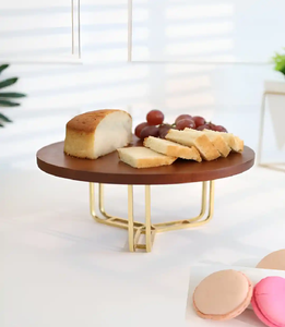 Wood <b>top</b> metal <b>cake</b> stand with chic <b>gold</b> wire base. A rustic modern look. Available at wholesale prices - Product Image 1
