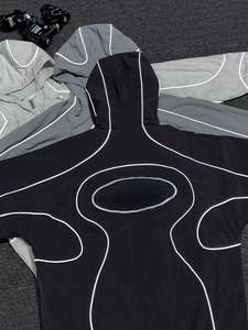 ชุดกีฬาไนลอนกันน้ำสะท้อนแสงแบบกำหนดเอง พร้อมเสื้อแจ็คเก็ตกันลมลายทางน้ำหนักเบาสำหรับวิ่งและสวมใส่ในชีวิตประจำวัน - Product Image 2