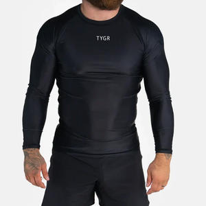 Haute Qualité 220gsm Noir Fluorescent Tissu MMA Grappling Rash Guards Manches Courtes En Gros avec Étiquette Blanche - Product Image 5