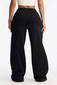 Pantalones Deportivos Anchos Blancos y Negros para Mujer, Cintura con Cordón Ajustable, Estilo Casual y Urbano con Bolsillos - Product Image 3