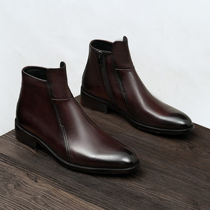 Botas de Piel de Oveja Marrón de Lujo por Encima de la Rodilla con Superficie Impermeable y Forro Antideslizante para Clima Frío y Uso Formal - Product Image 1