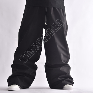 Pantalon de neige imperméable noir unisexe OEM avec doublure polaire chaude à la taille et protection imperméable pour l'hiver - Product Image 1
